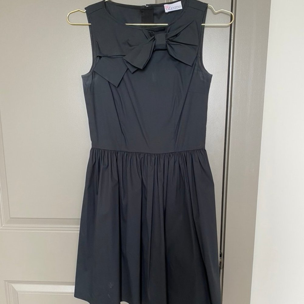 Black dress with bow tie details